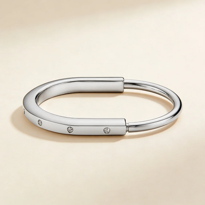 T Lock Bangle Bracelet in a Timeless Design