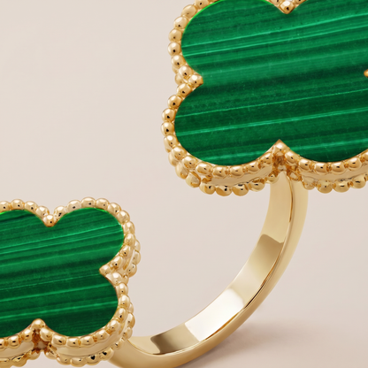 Green Clover Between The Finger Ring