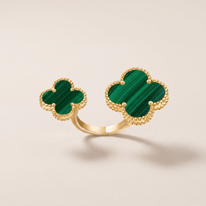 Green Clover Between The Finger Ring