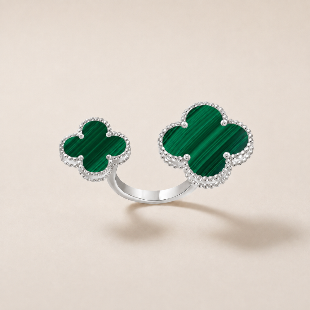 Green Clover Between The Finger Ring