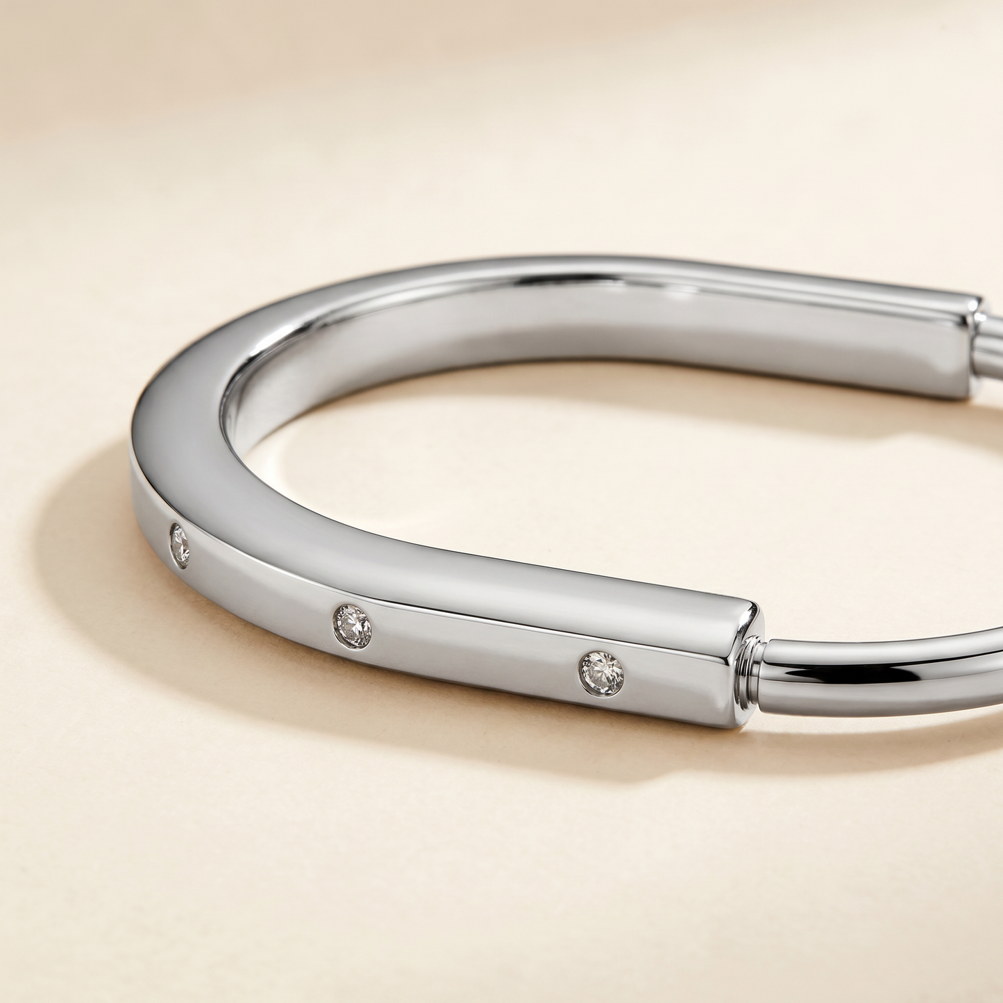 T Lock Bangle Bracelet in a Timeless Design