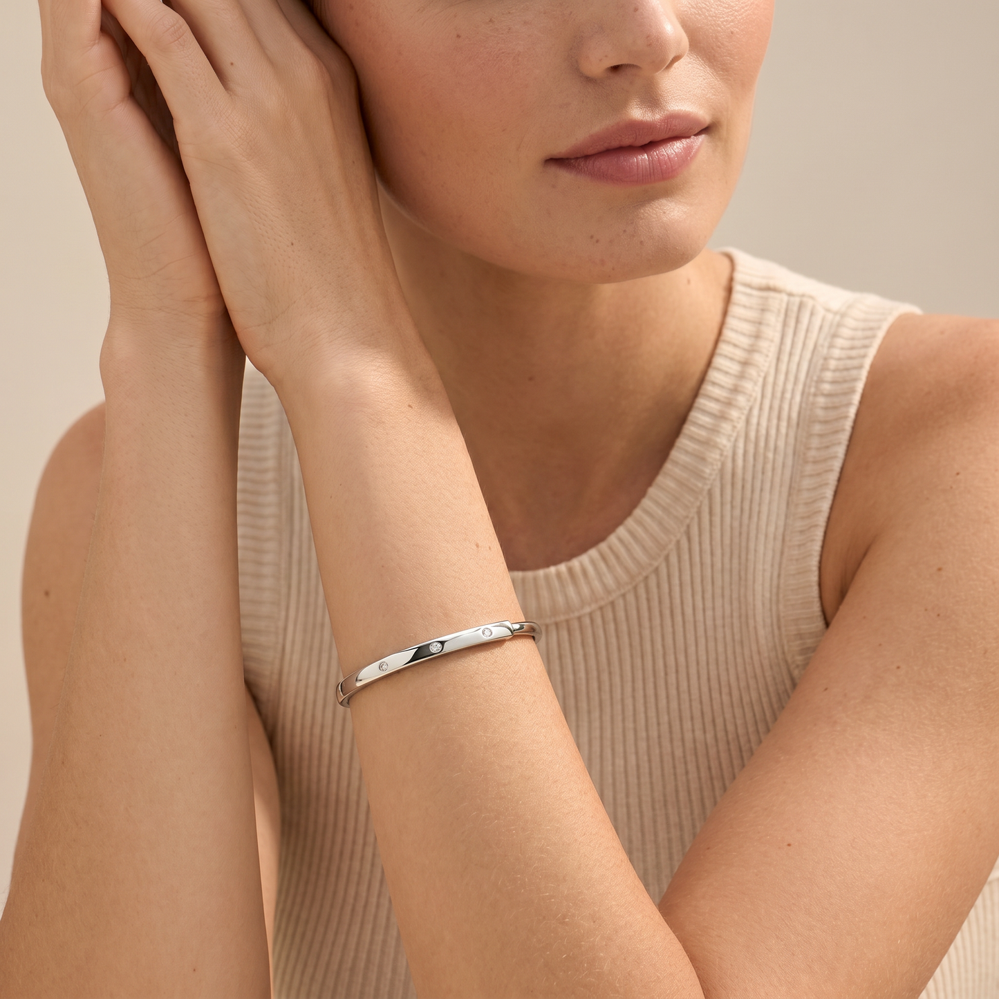T Lock Bangle Bracelet in a Timeless Design