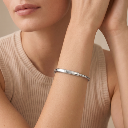 T Lock Bangle Bracelet in a Timeless Design
